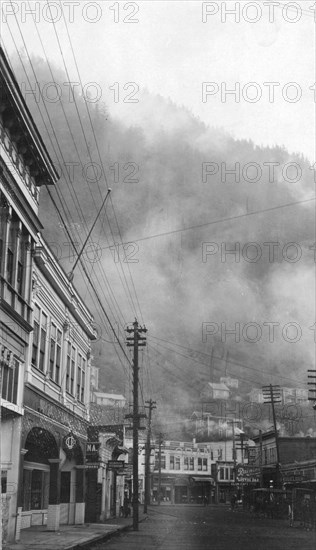 Clouds descending into the main street, between c1900 and 1923. Creator: Unknown.