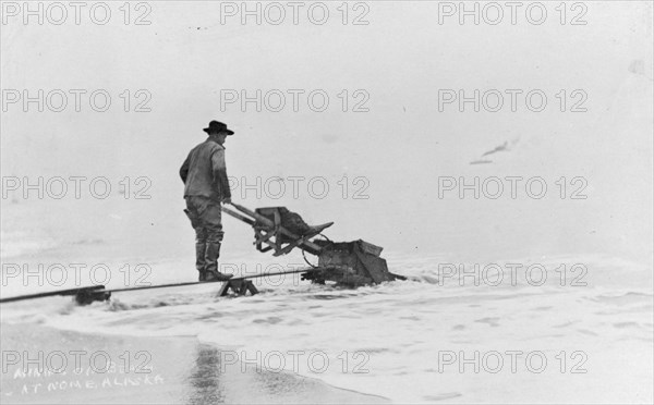 Mining on beach, between c1900 and c1930. Creator: Unknown.