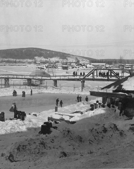 Winter bridge over river, between c1900 and c1930. Creator: Unknown.