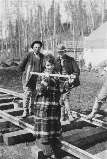 Martha White driving first spike in the government railway, between c1900 and c1930. Creator: Unknown.