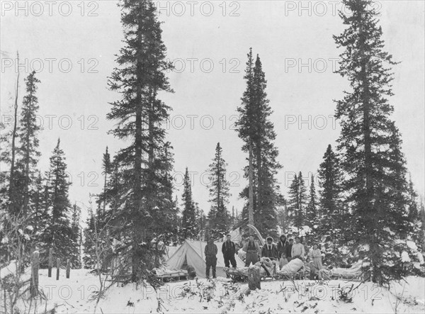 Camp north of the Arctic Circle, between c1900 and c1930. Creator: Unknown.