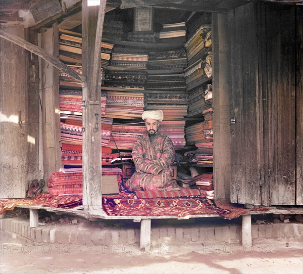 Fabric merchant, Samarkand, between 1905 and 1915. Creator: Sergey Mikhaylovich Prokudin-Gorsky.