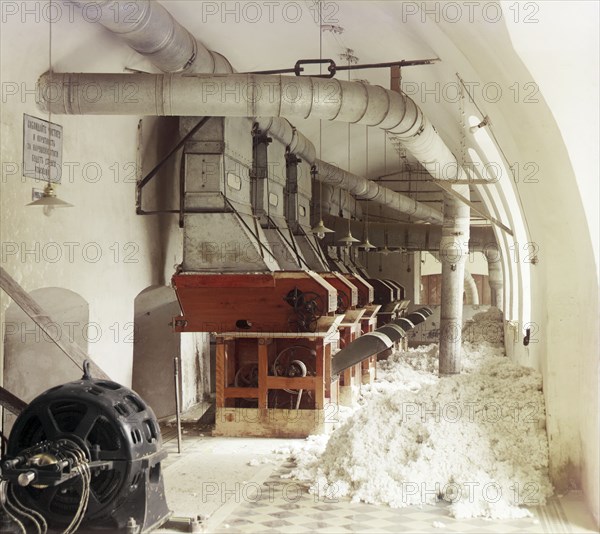 Cotton textile mill interior, probably in Tashkent, between 1905 and 1915. Creator: Sergey Mikhaylovich Prokudin-Gorsky.