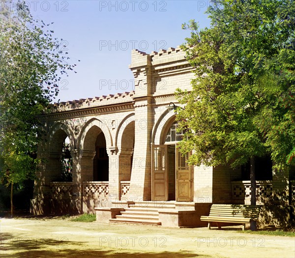 Brick building with arched entrance and arcade, between 1905 and 1915. Creator: Sergey Mikhaylovich Prokudin-Gorsky.