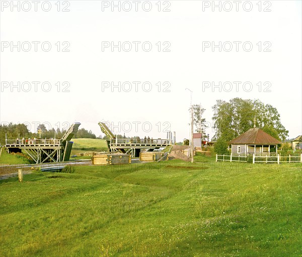 Volokov drawbridge on the Vytegra River, 1909. Creator: Sergey Mikhaylovich Prokudin-Gorsky.