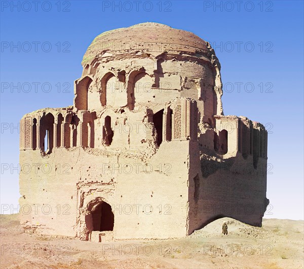 Front view of a crumbling mosque, with a man standing beside it, between 1905 and 1915. Creator: Sergey Mikhaylovich Prokudin-Gorsky.