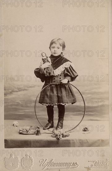 Portrait of a girl with a hoop and a doll, 1900. Creator: I. Antonopulo.