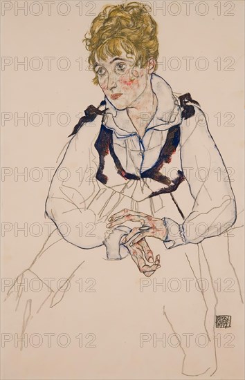 The artist's wife, seated, 1917. Creator: Egon Schiele.