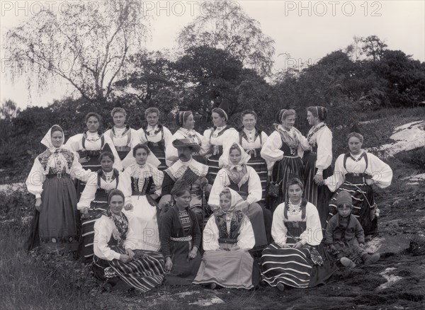 Group picture of the staff at Skansen, hills and a man in the middle, 1896.  Creator: Frans Gustaf Klemming.