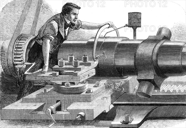 Manufacture of the Armstrong Gun at Woolwich Arsenal: finish-turning a 100-pounder, 1862. Creator: Unknown.