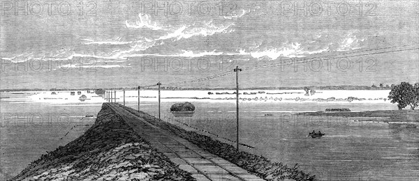 The Flood in the Fens: the submerged railway between Lynn and Wisbeach, 1862. Creator: Unknown.