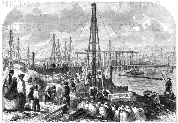 The Flood in the Fens: making the cofferdam, 1862. Creator: Unknown.