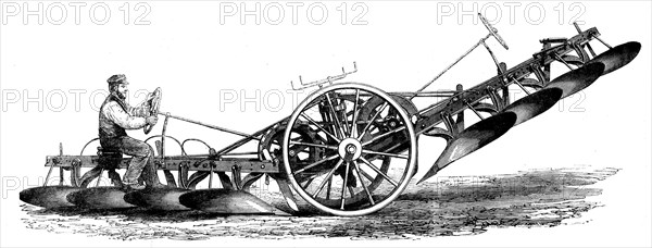 The International Exhibition: Fowler's patent four-furrow steam-plough, 1862. Creator: Unknown.