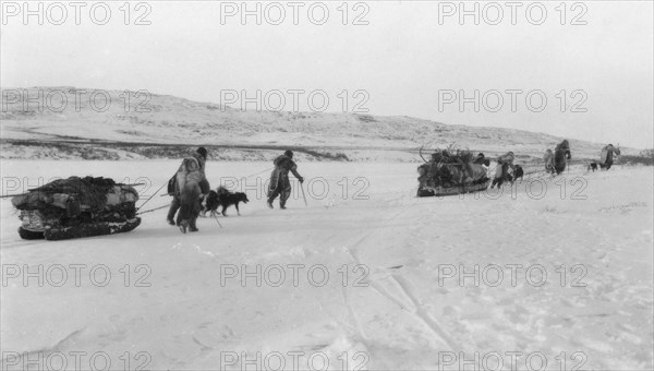 Eskimos on their way to the sea, between c1900 and 1929. Creator: Unknown.