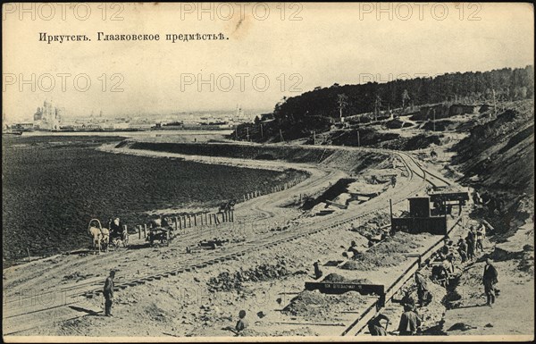 View of the city of Irkutsk from the Irkutsk Bridge. Glazkovskoe suburb, 1900-1904. Creator: Unknown.