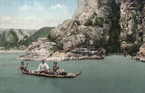 Crossing the Katun River on a Dugout Canoe near Dzhir-Bom, Above the Mouth of the Chui..., 1911-13. Creator: Sergei Ivanovich Borisov.