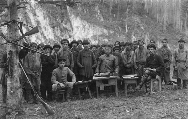 Group of Shoria Men with Members of the Land-Management Expedition, 1913. Creator: GI Ivanov.
