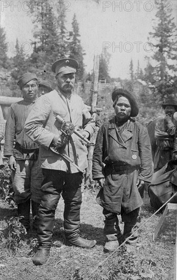 Topographer, a Member of the Land-Management Expedition with the Village Headman, 1913. Creator: GI Ivanov.