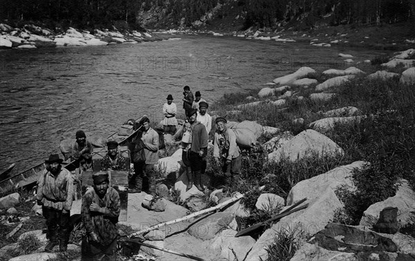 Carrying the Heavy Load of a Land-Management Expedition, Detouring the Mrassu River Rapid, 1913. Creator: GI Ivanov.