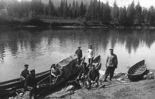 Topographers by the Boats on the Mrassu River Shore, Near the Ust'-Kabyrza Ulus, 1913. Creator: GI Ivanov.