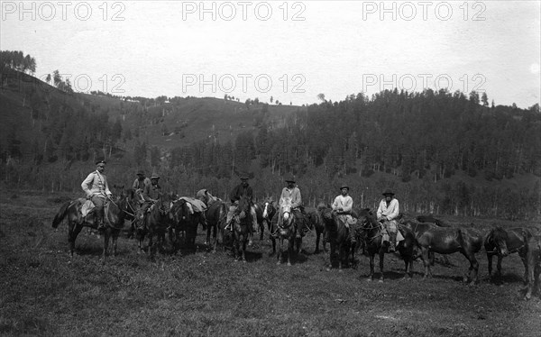 Topographer and Laborers Near the Ust'-Kabyrza Ulus, 1913. Creator: GI Ivanov.