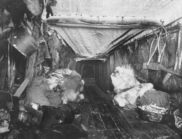 Interior of Eskimo hut, 1916. Creator: Lomen Brothers.