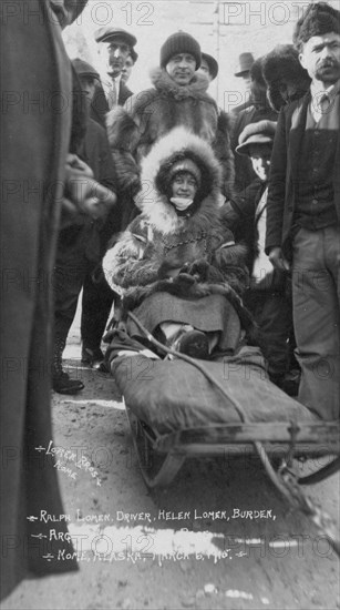 Ralph and Helen Lomen on dog sled, ready for race, 1915. Creator: Lomen Brothers.