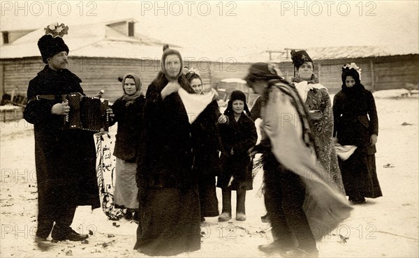 Mummers on the streets of the Znamensky Glass Factory on Christmastide, 1913-1914. Creator: S. Ia. Mamontov.