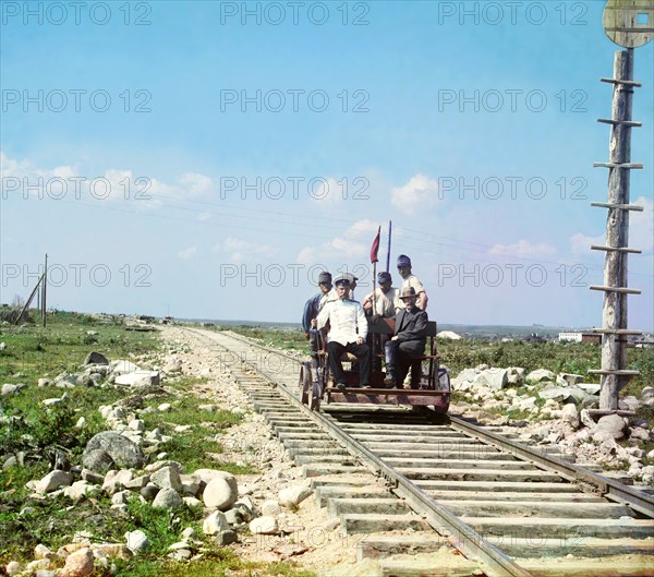 On the handcar outside Petrozavodsk on the Murmansk railway, 1915. Creator: Sergey Mikhaylovich Prokudin-Gorsky.