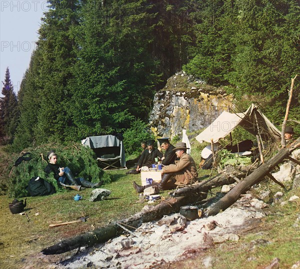 Night camp by a rock on the bank of the Chusovaya, 1912. Creator: Sergey Mikhaylovich Prokudin-Gorsky.