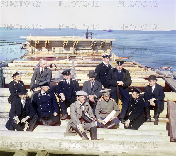 Group of railroad construction participants on the pier in Kem-Pristan, 1915. Creator: Sergey Mikhaylovich Prokudin-Gorsky.