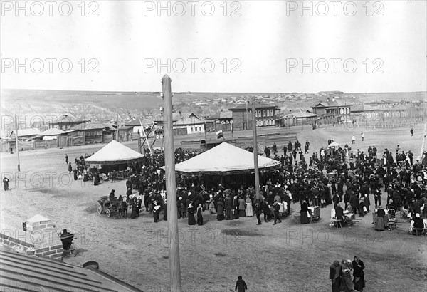 Carousels on Novobazarnaya Square, 1910-1919. Creator: N. A. Stavrovskii.