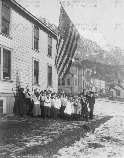 Camp-Fire Girls saluting the flag, 1915. Creator: Unknown.