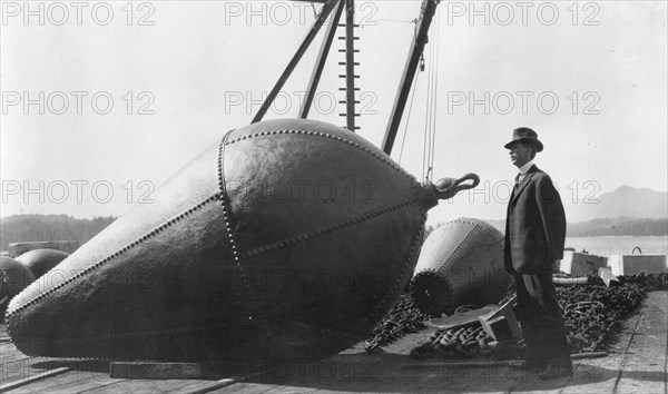 Frank G. Carpenter on lighthouse wharf, Ketchikan, 1915. Creator: Unknown.