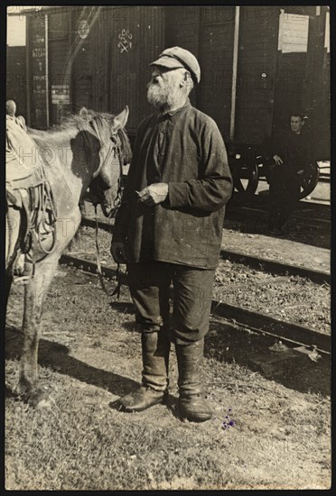 Bira station - Guide with a horse, 1929. Creator: Unknown.