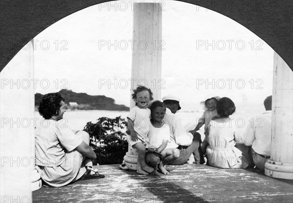 Nanny Ekaterina, Yuli and Vera Briner, unknown, Vera Dmitrievna Briner with daughter..., 1923. Creator: Unknown.