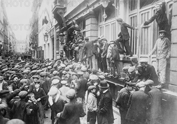 Paris, Newsboys waiting for "Extras", between c1914 and c1915. Creator: Bain News Service.