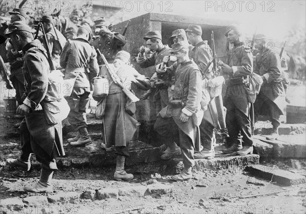 French troops drinking water on march, between c1914 and c1915. Creator: Bain News Service.