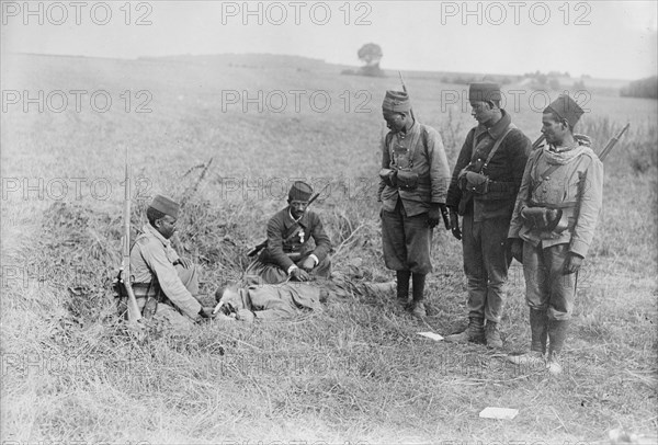 French succoring wounded German, 1914. Creator: Bain News Service.