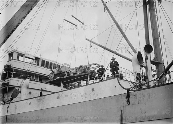 Loading war auto. on Sugura [i.e., Loading a truck chassis on the Suruga], between c1914 and c1915. Creator: Bain News Service.