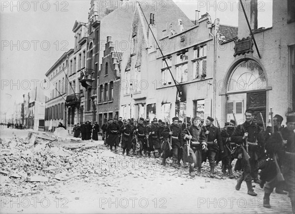 Belgians re-enter Termonde, between c1914 and c1915. Creator: Bain News Service.