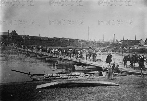 Spahis cross boat bridge, Compiegne, 1914. Creator: Bain News Service.