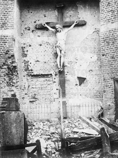 Fromelles - Uninjured figure in wrecked church, 29 July 1915. Creator: Bain News Service.