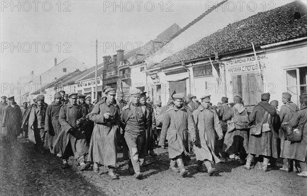 Russian & Servian [i.e., Serbian] prisoners in Servian village, between c1915 and c1920. Creator: Bain News Service.