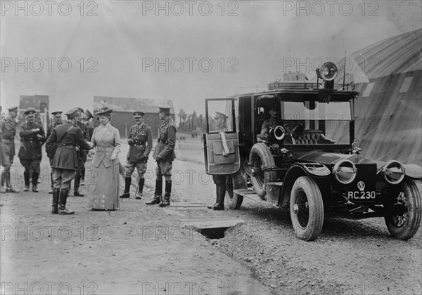 Queen Mary visits aerodrome shed, 5 Jul 1917. Creator: Bain News Service.