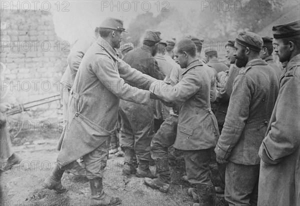 Bread to German prisoners, Champagne, between c1915 and c1920. Creator: Bain News Service.