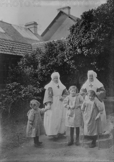 Caring for children, Quimper, 27 June 1918. Creator: Bain News Service.