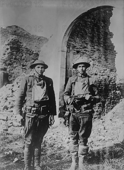 U.S. soldiers & German pistol, 11 Mar 1918. Creator: Bain News Service.