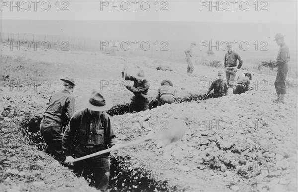 Marines dig a trench (France), 23 Jan 1918. Creator: Bain News Service.