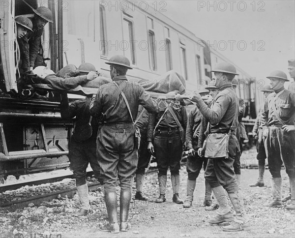 American soldiers & wounded, 27 Apr 1918. Creator: Bain News Service.